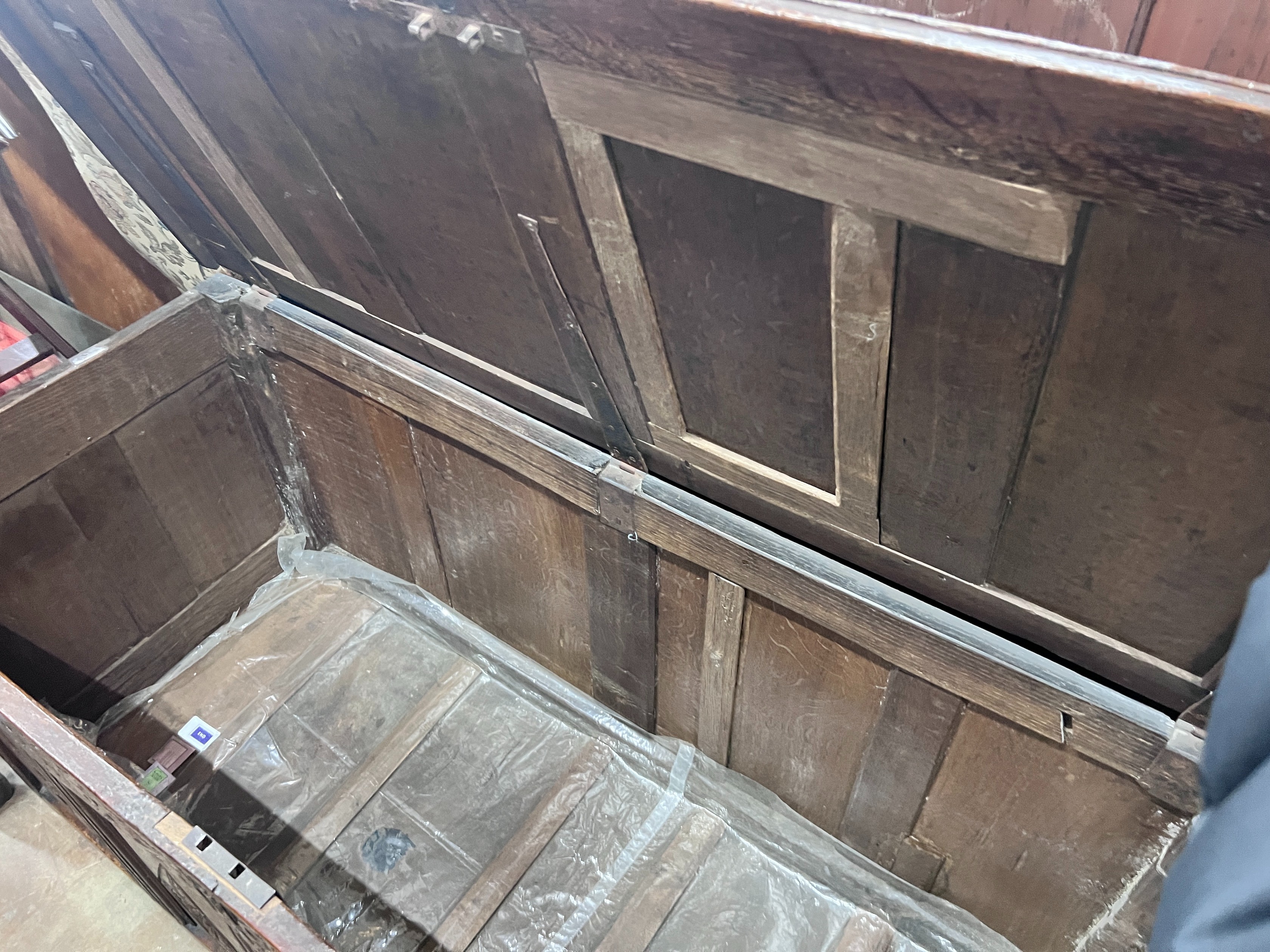 An early 18th century panelled oak coffer, width 154cm *Please note the sale commences at 9am.